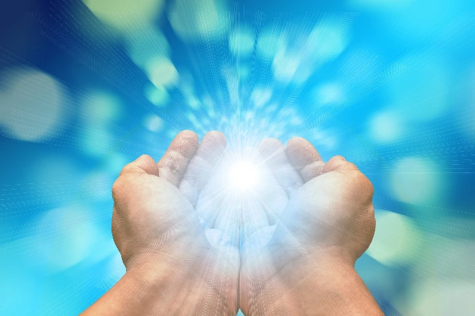 hands holding energy